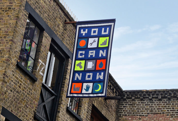 Painted sign on a brick building