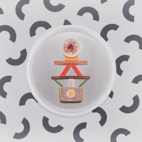Illustrated plate with a stacked figure