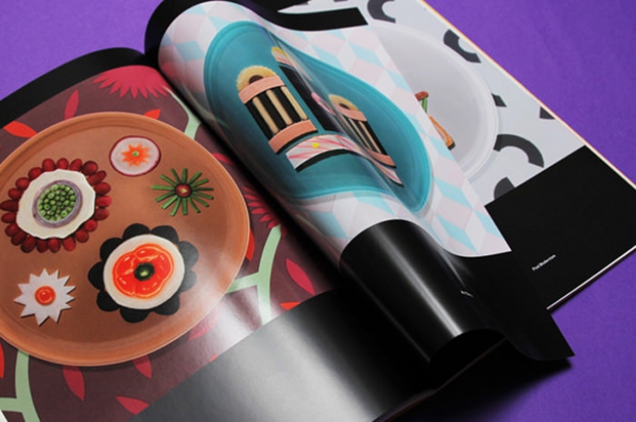 Open magazine spread with an illustration