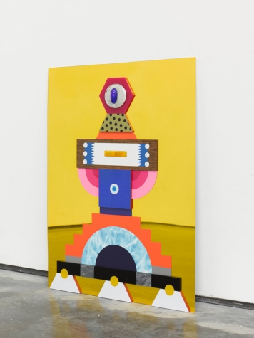 Yellow panel with a painted totem figure