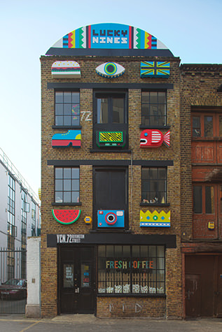 Brick building with a painted facade