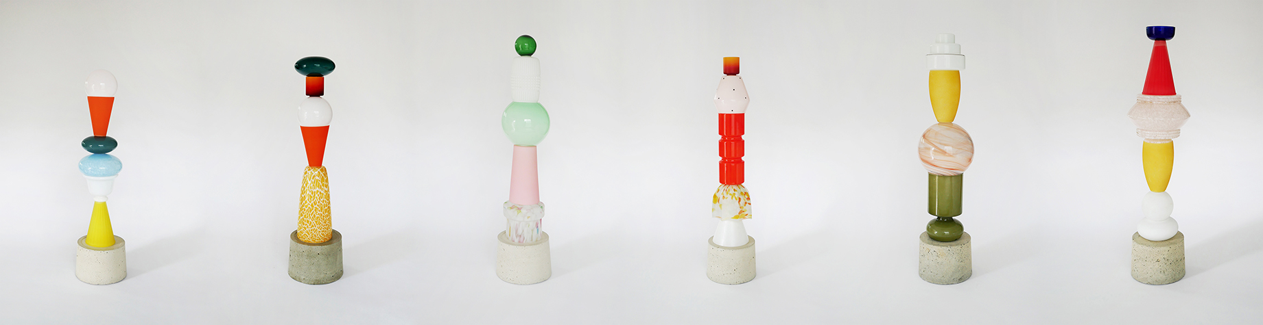 Row of small totem lights in different colours