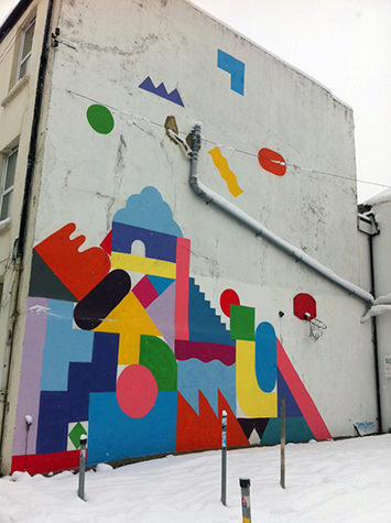 Exterior wall painted with coloured blocks